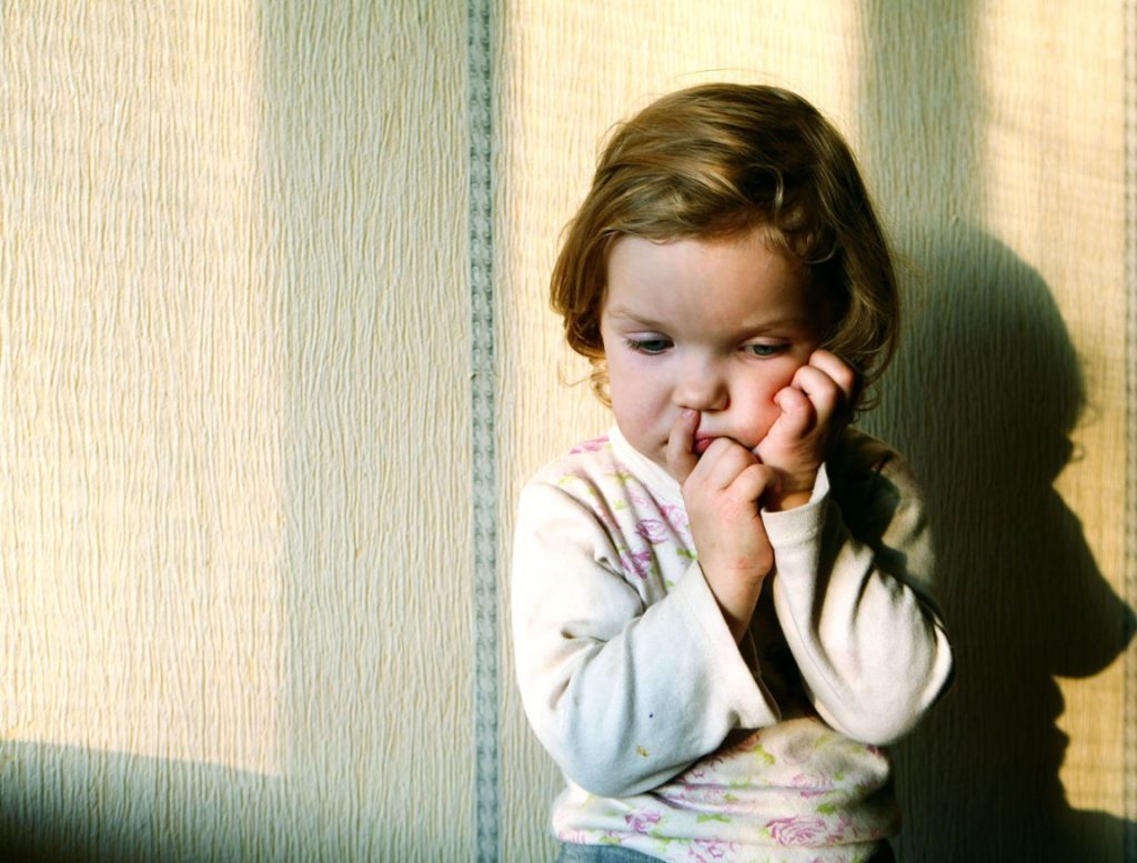 sad, withdrawing child