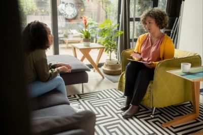 a-teen-girl-in-psychotherapy-2026-01-06-09-45-54-utc (1) Woman seeking help from a therapist