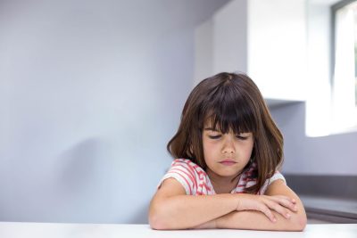upset child sitting
